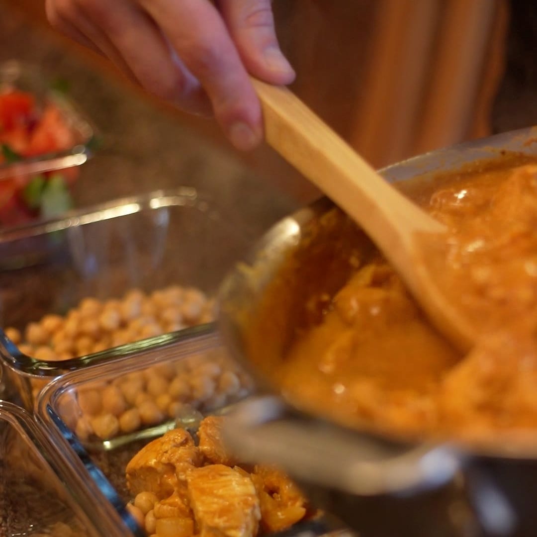 High-fiber chickpea curry portioned into meal-prep containers
