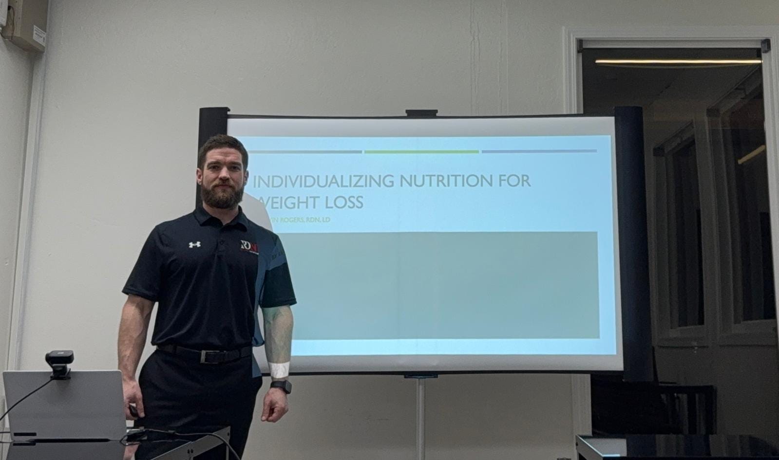 Kevin Rogers presenting a talk titled Individualizing Nutrition for Weight Loss